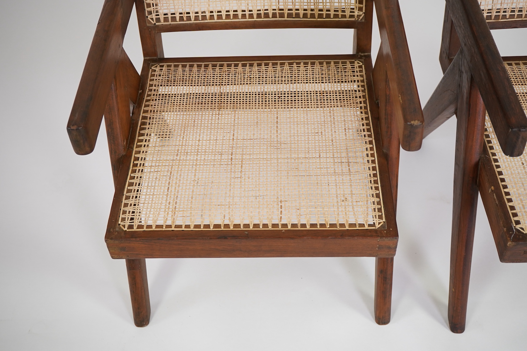 Pierre Jeanneret (Swiss, 1896-1967) for Chandigarh: A pair of cashew 'Easy' armchairs PJ-010105A